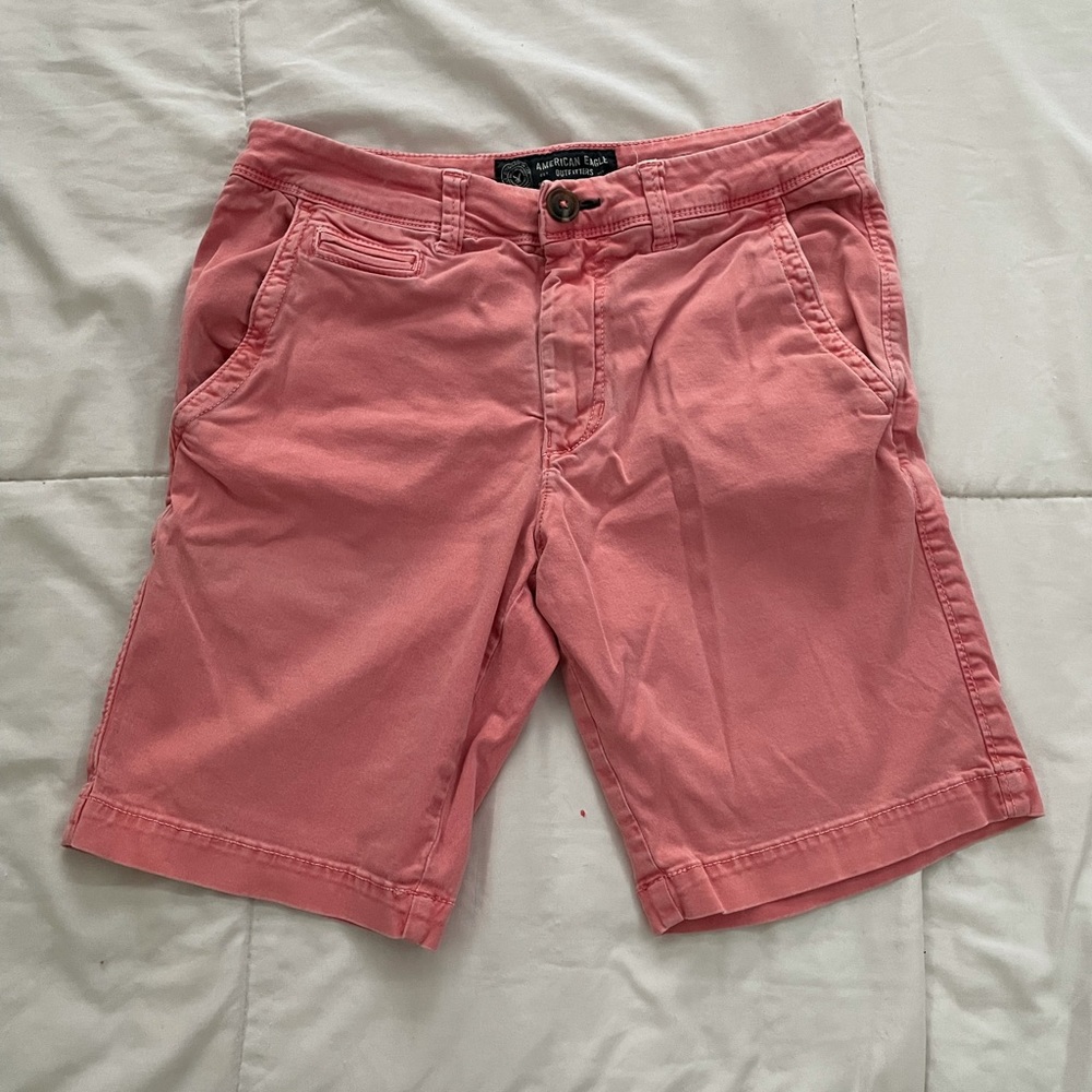 Men salmon colored flat front shorts